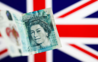 The Image Of The Queen Elizabeth II On Pound Banknote And Coins