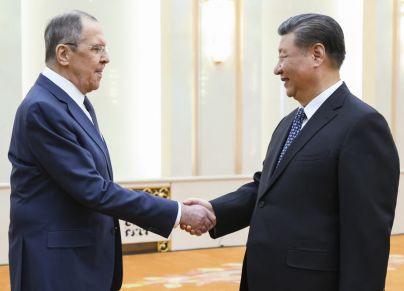 رئيس الصين ووزير الخارجية الروسي