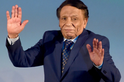 Egyptian actor Adel Imam waves from stage