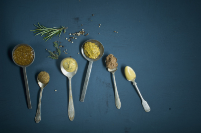 Homemade mustard, different sorts on spoon, honey mustard, sweet...