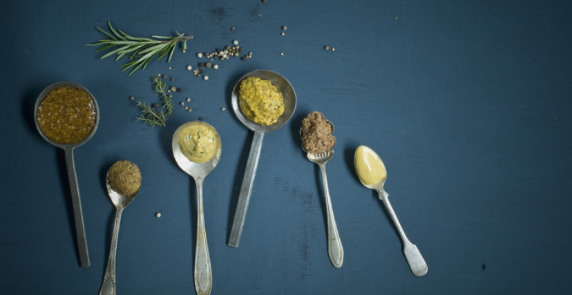 Homemade mustard, different sorts on spoon, honey mustard, sweet...