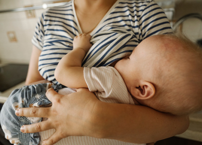 mother breastfeeding her baby