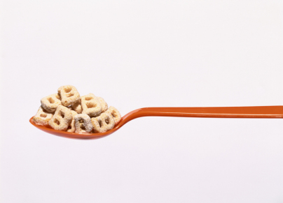 Spoon with cereal shaped like a "B